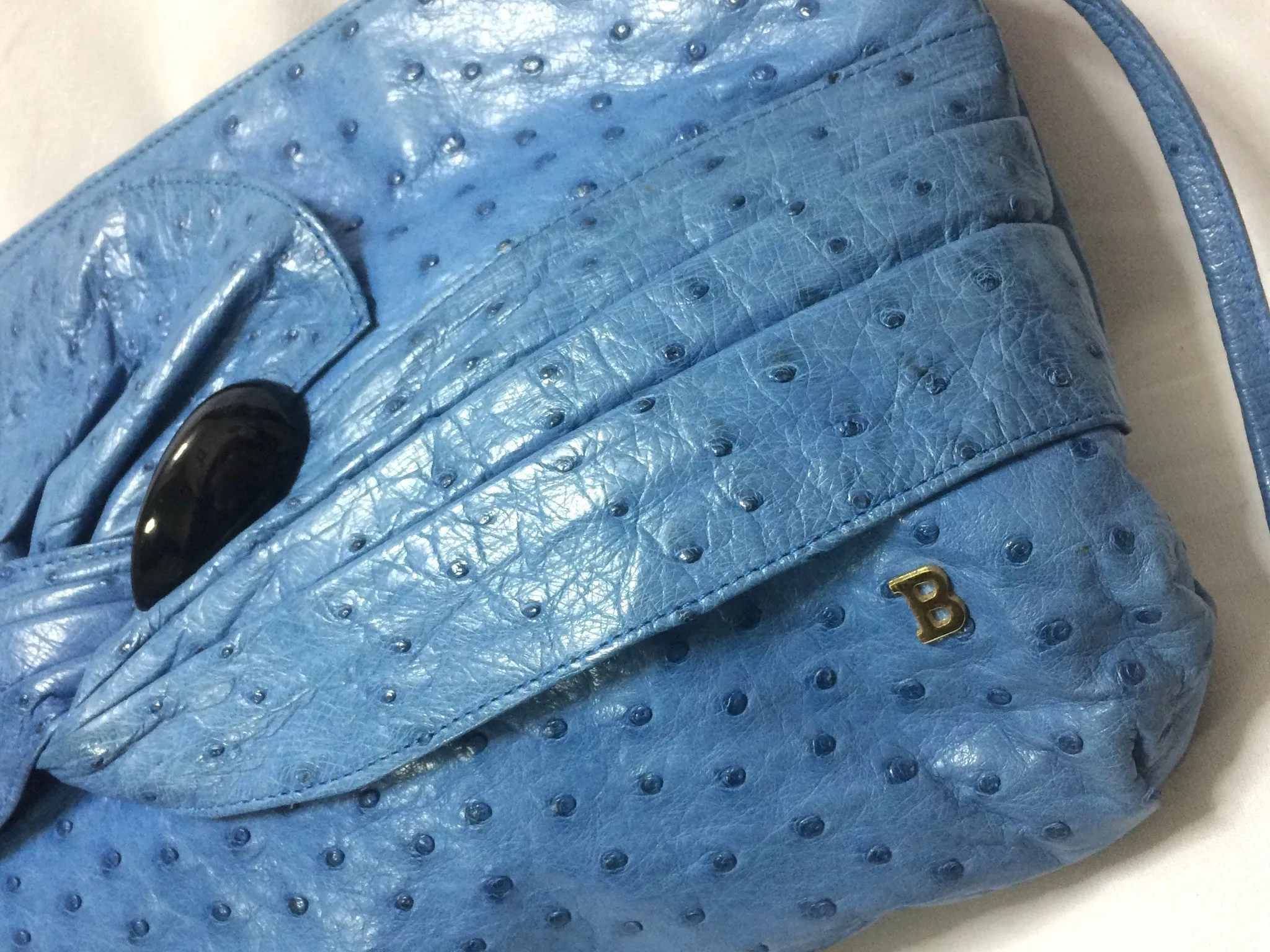1980s. Vintage BALLY genuine blue ostrich leather shoulder bag with gathered knot, bow design and black motif. Made in W. Germany. 050406r3