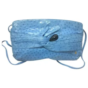 1980s. Vintage BALLY genuine blue ostrich leather shoulder bag with gathered knot, bow design and black motif. Made in W. Germany. 050406r3