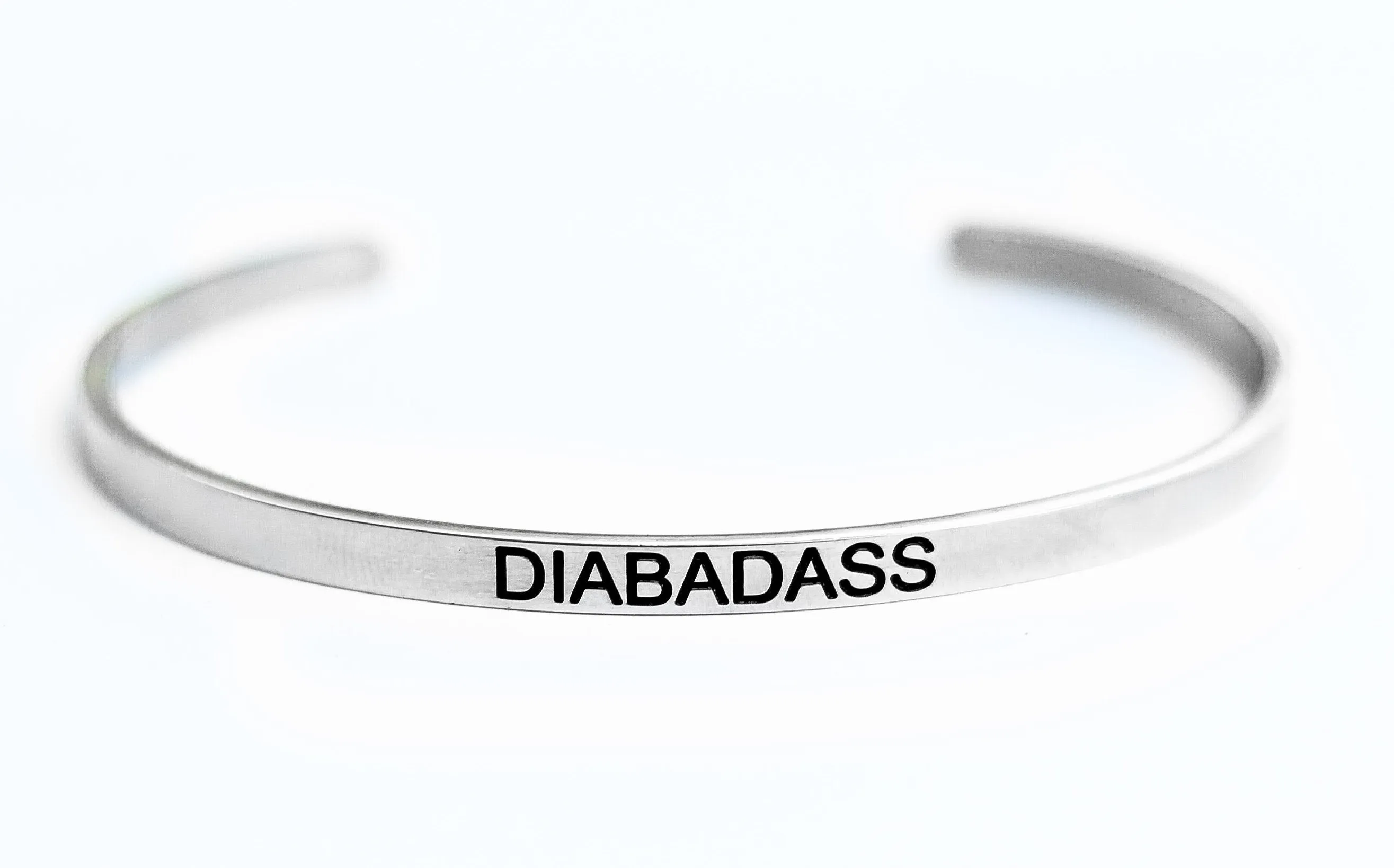 Engraved stainless steel cuffs.