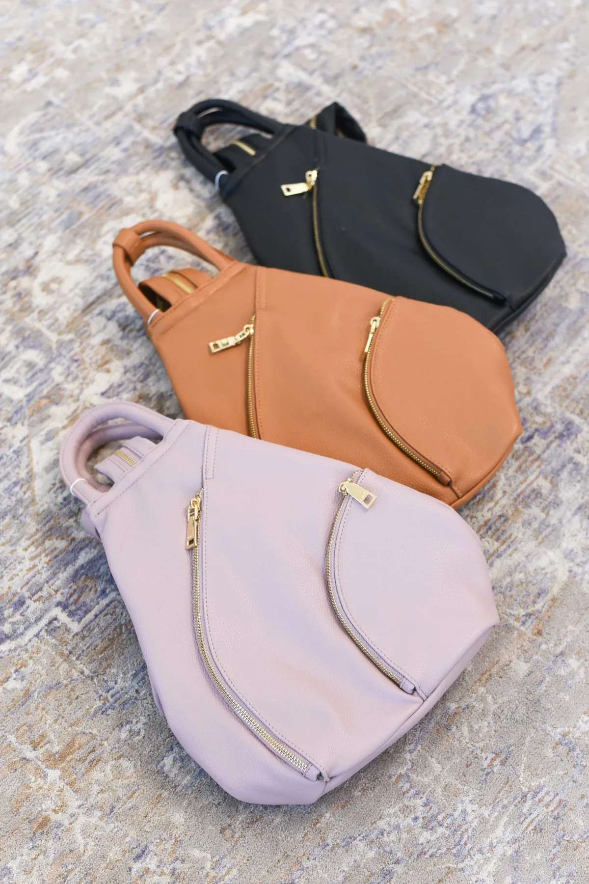 Maura Diagonal Zipper Backpack
