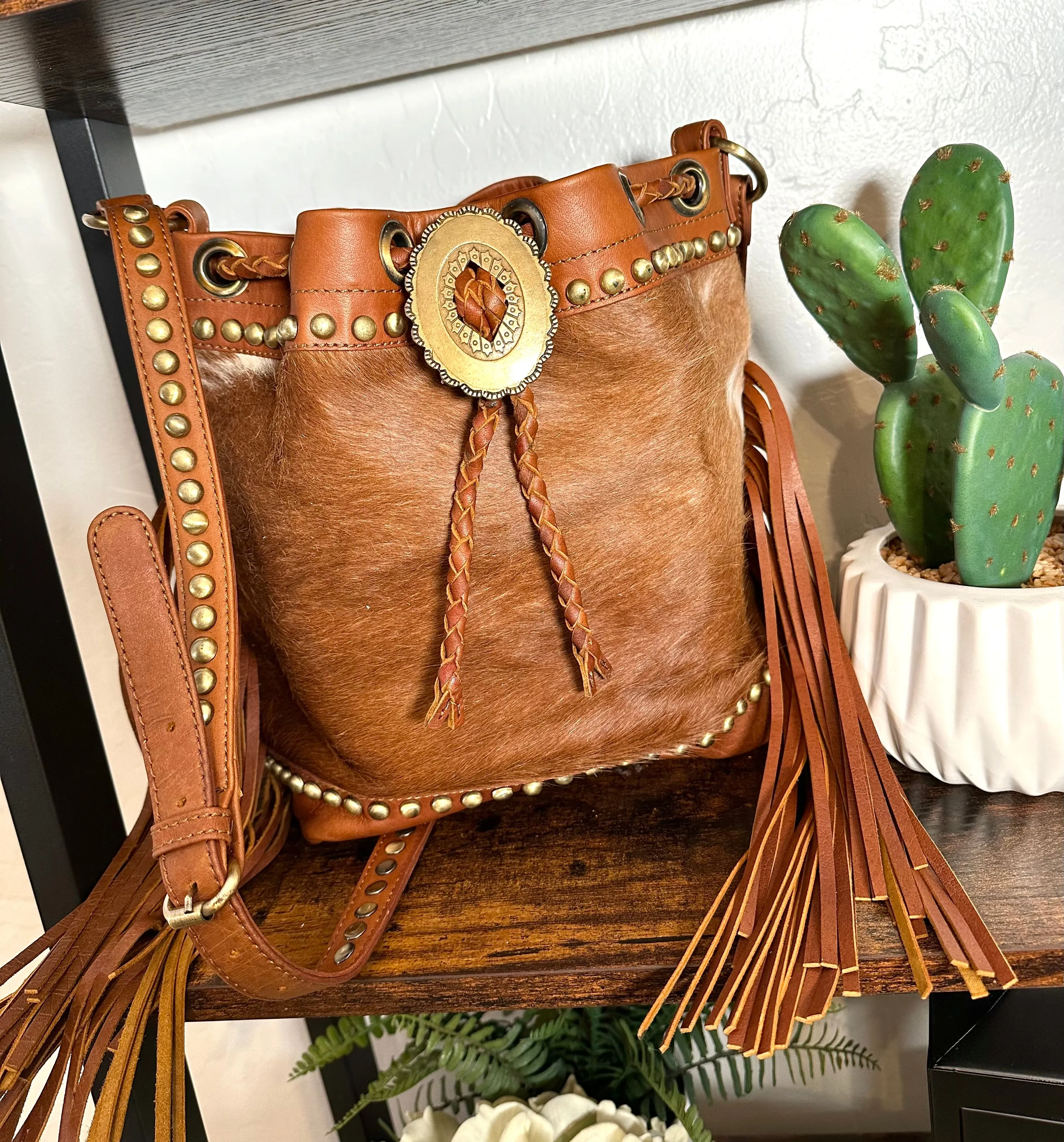 Tan Cowhide and Leather Bolo Tie Bucket Style Handbag