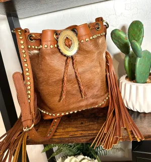 Tan Cowhide and Leather Bolo Tie Bucket Style Handbag