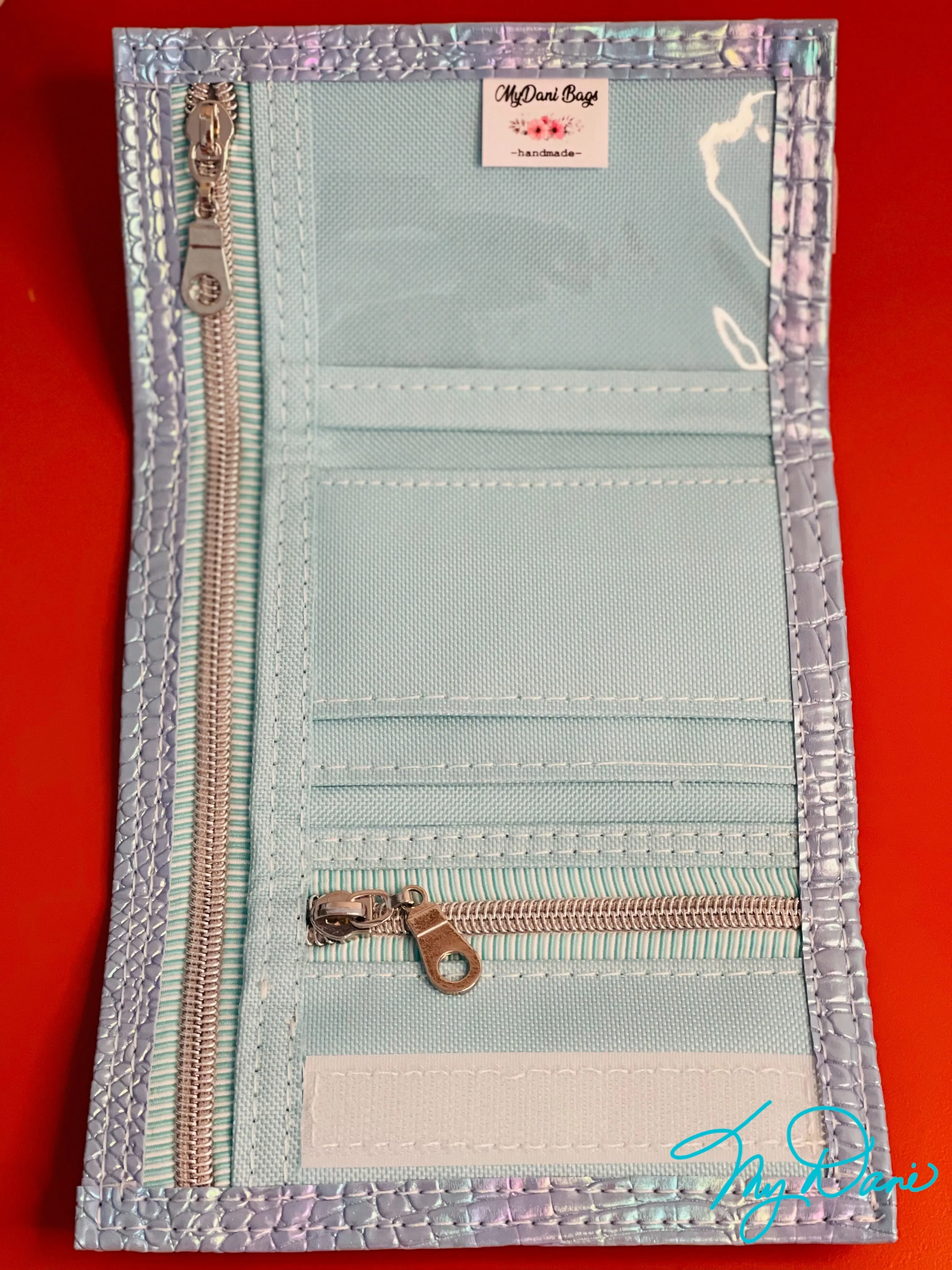 The Andrew Trifold Wallet in Iridescent Lizard Light Blue
