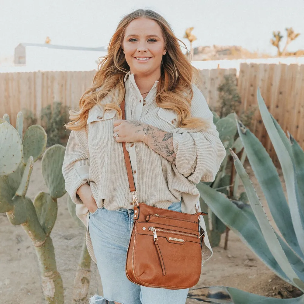 the EVERYDAY CROSSBODY cognac