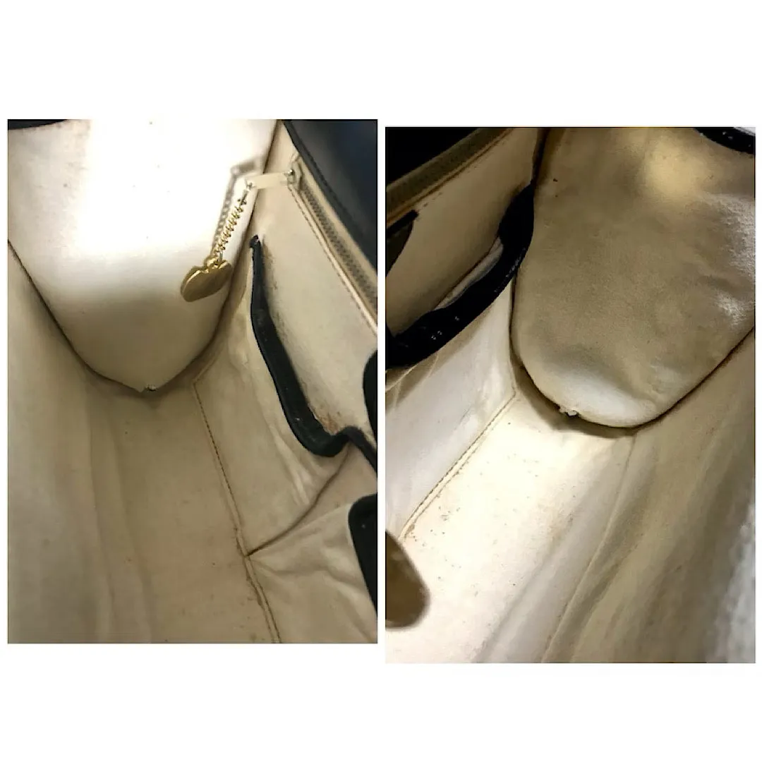 Vintage CELINE genuine black leather shoulder bag with gold and silver tone triomphe logo motif at front. Rare Celine leather bag.