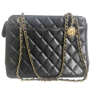 Vintage CHANEL black caviar matelasse chain shoulder bag with golden sun flower CC mark charm. Classic daily use bag.050315r5