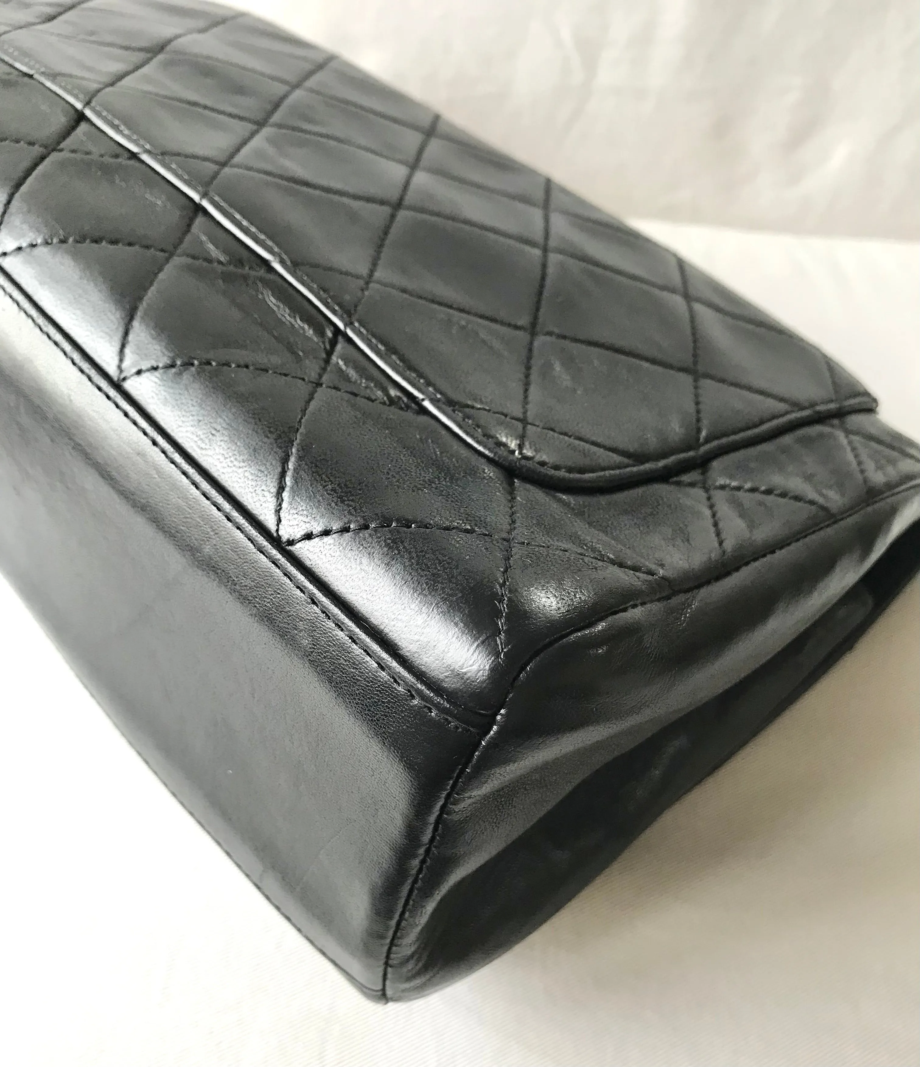 Vintage Chanel black leather 2.55 chain large shoulder bag with white trimming edge and a matching pouch. 0403284