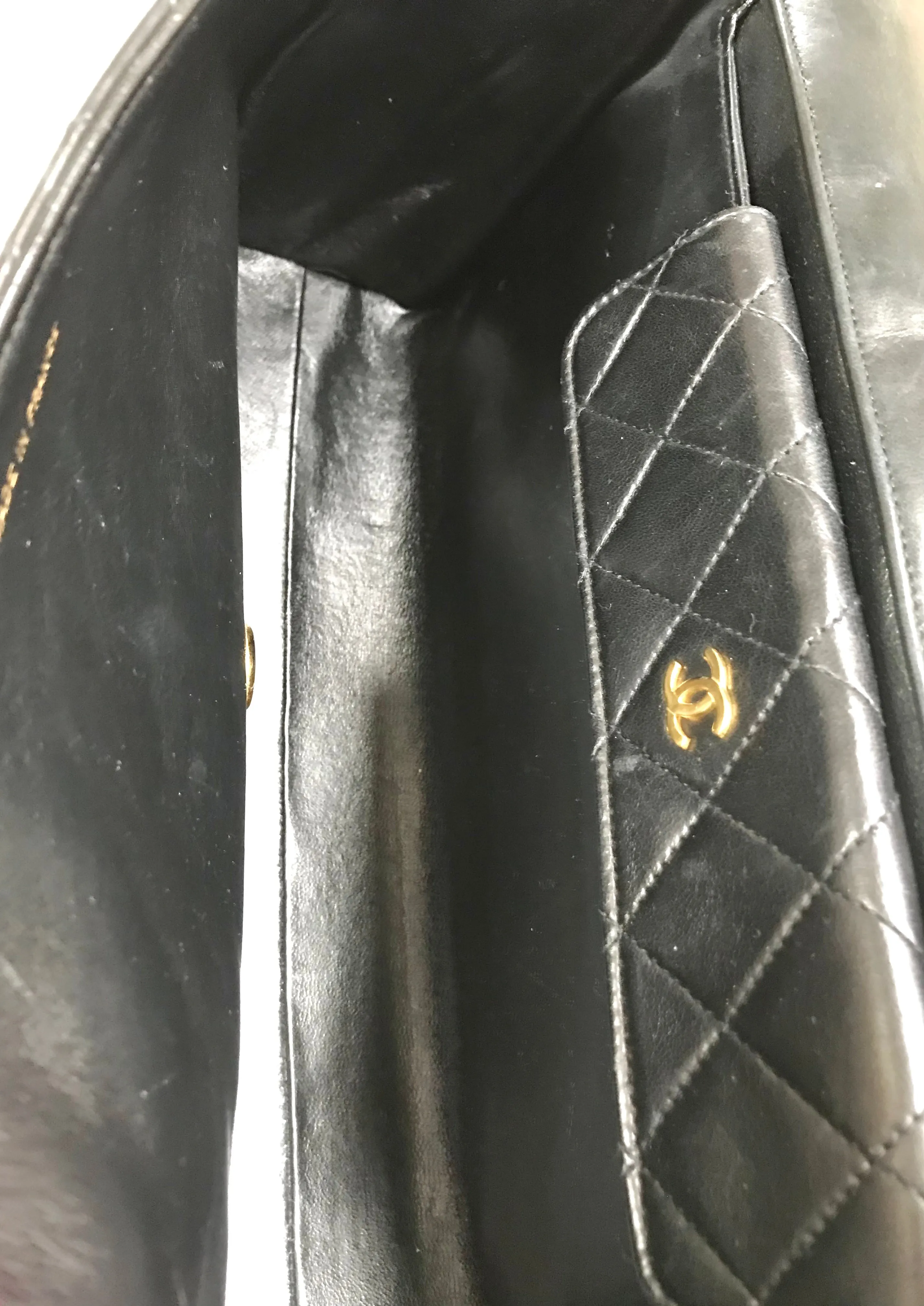 Vintage Chanel black leather 2.55 chain large shoulder bag with white trimming edge and a matching pouch. 0403284
