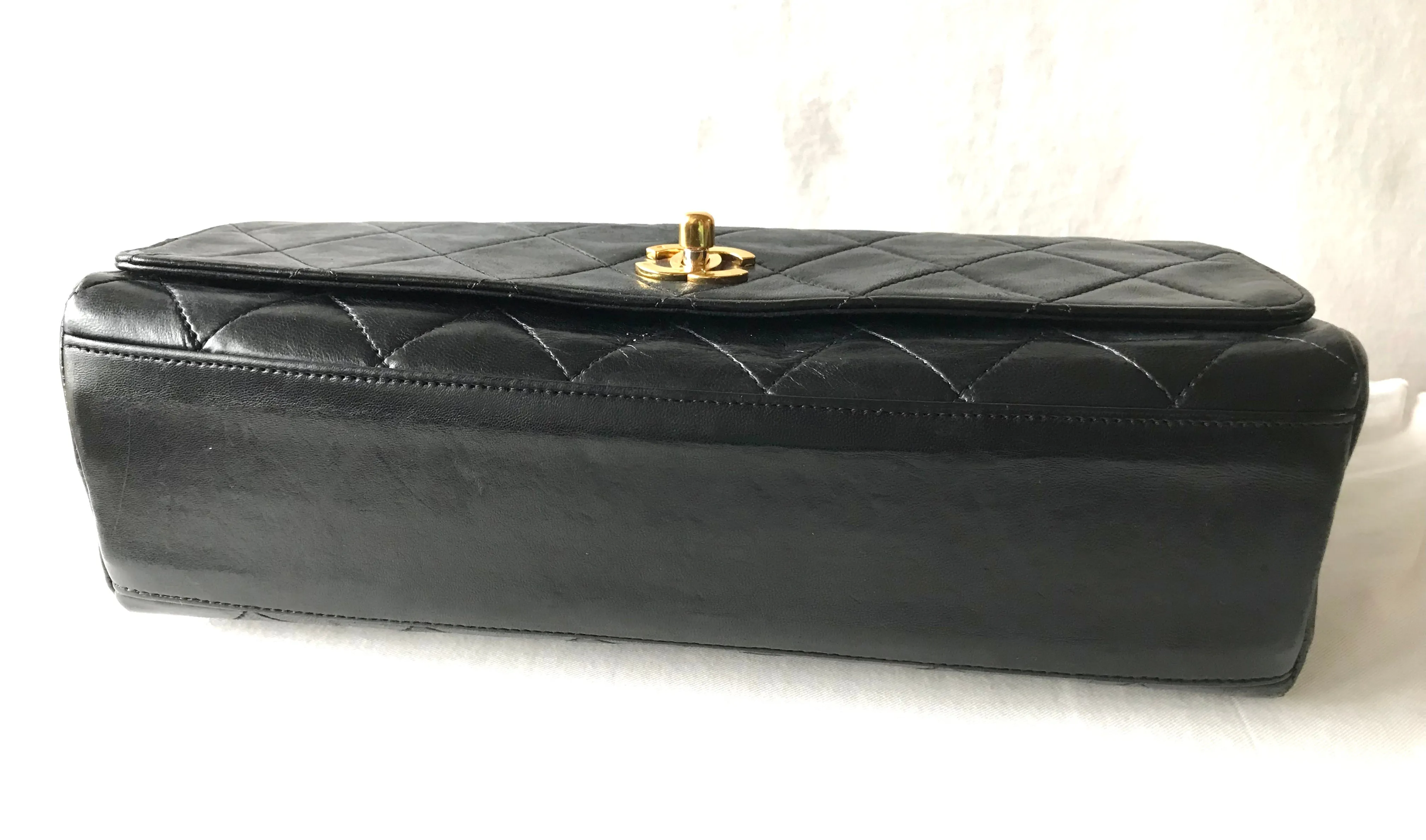 Vintage Chanel black leather 2.55 chain large shoulder bag with white trimming edge and a matching pouch. 0403284