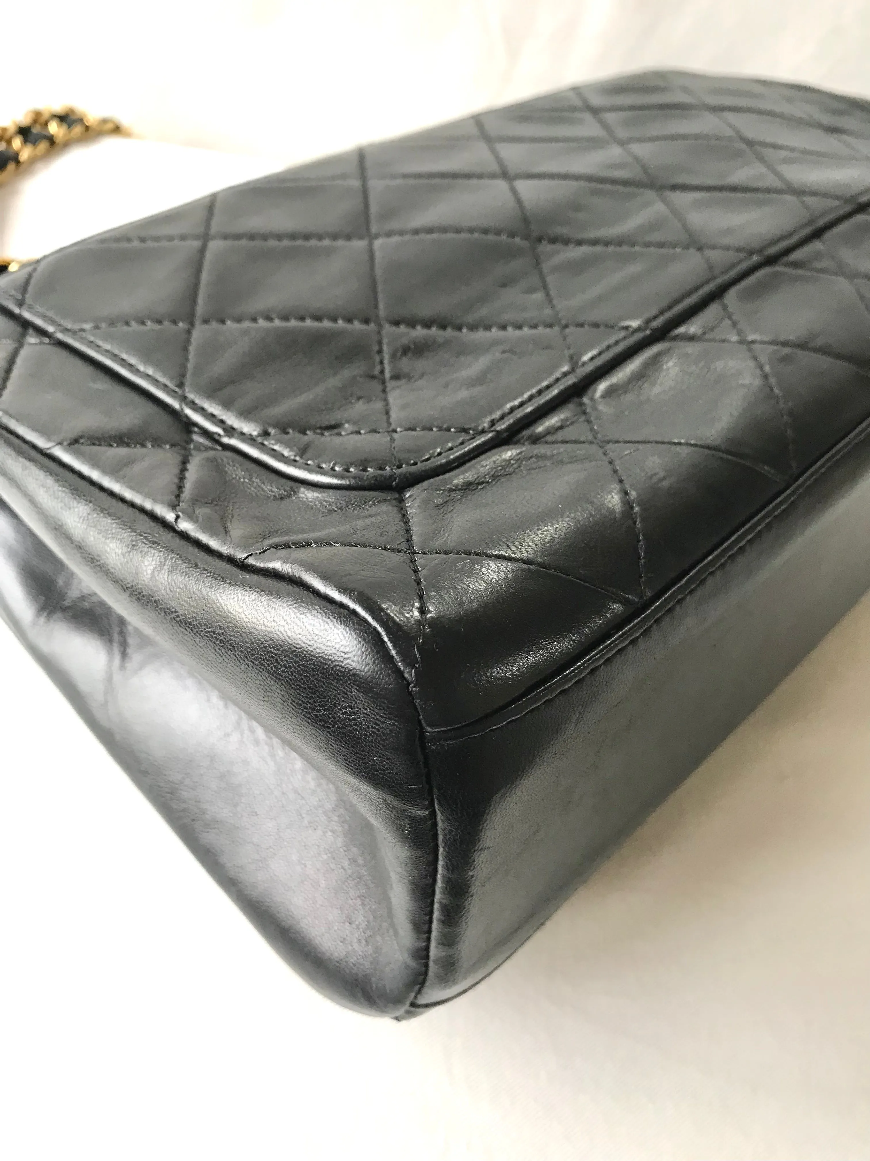 Vintage Chanel black leather 2.55 chain large shoulder bag with white trimming edge and a matching pouch. 0403284
