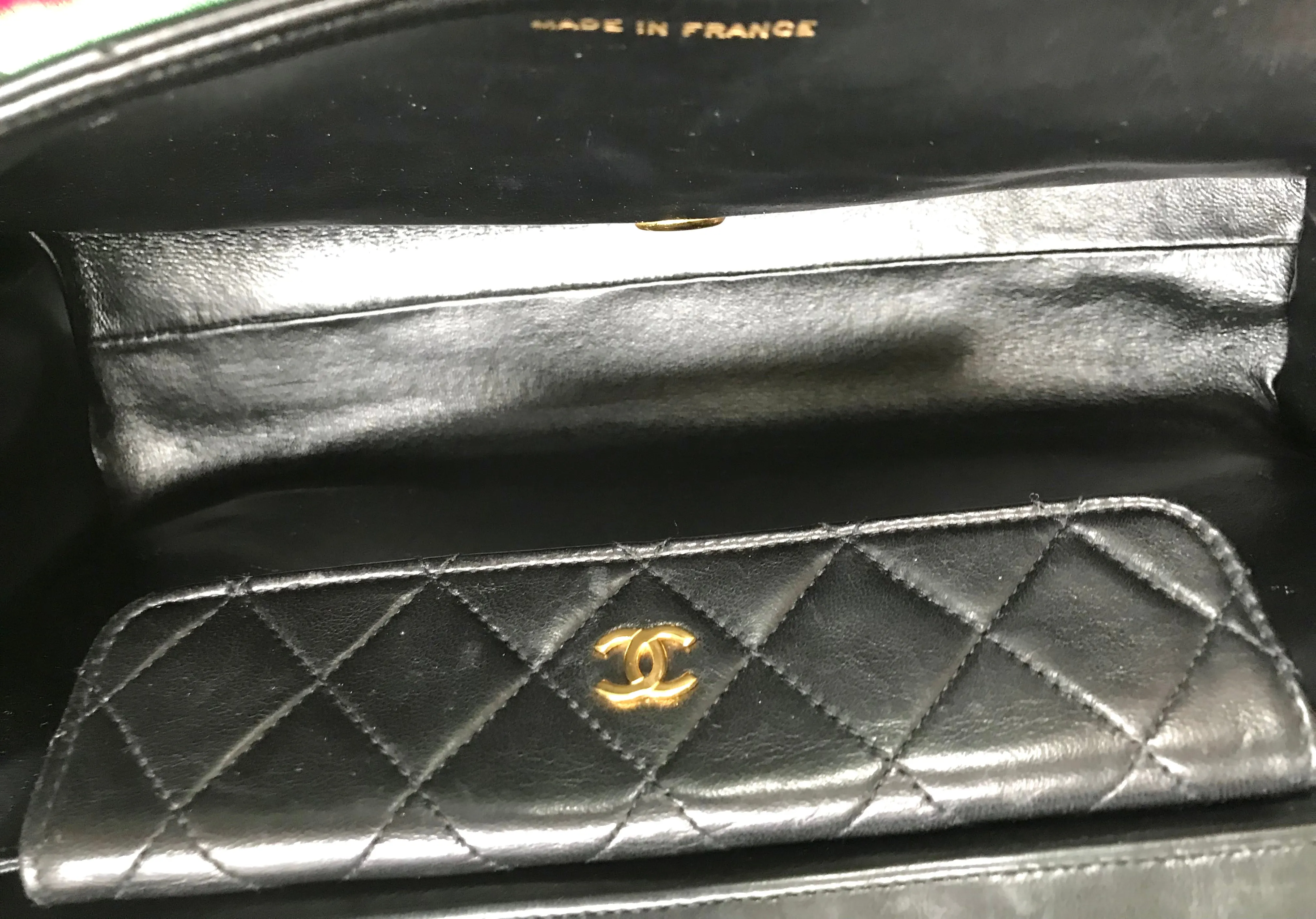 Vintage Chanel black leather 2.55 chain large shoulder bag with white trimming edge and a matching pouch. 0403284