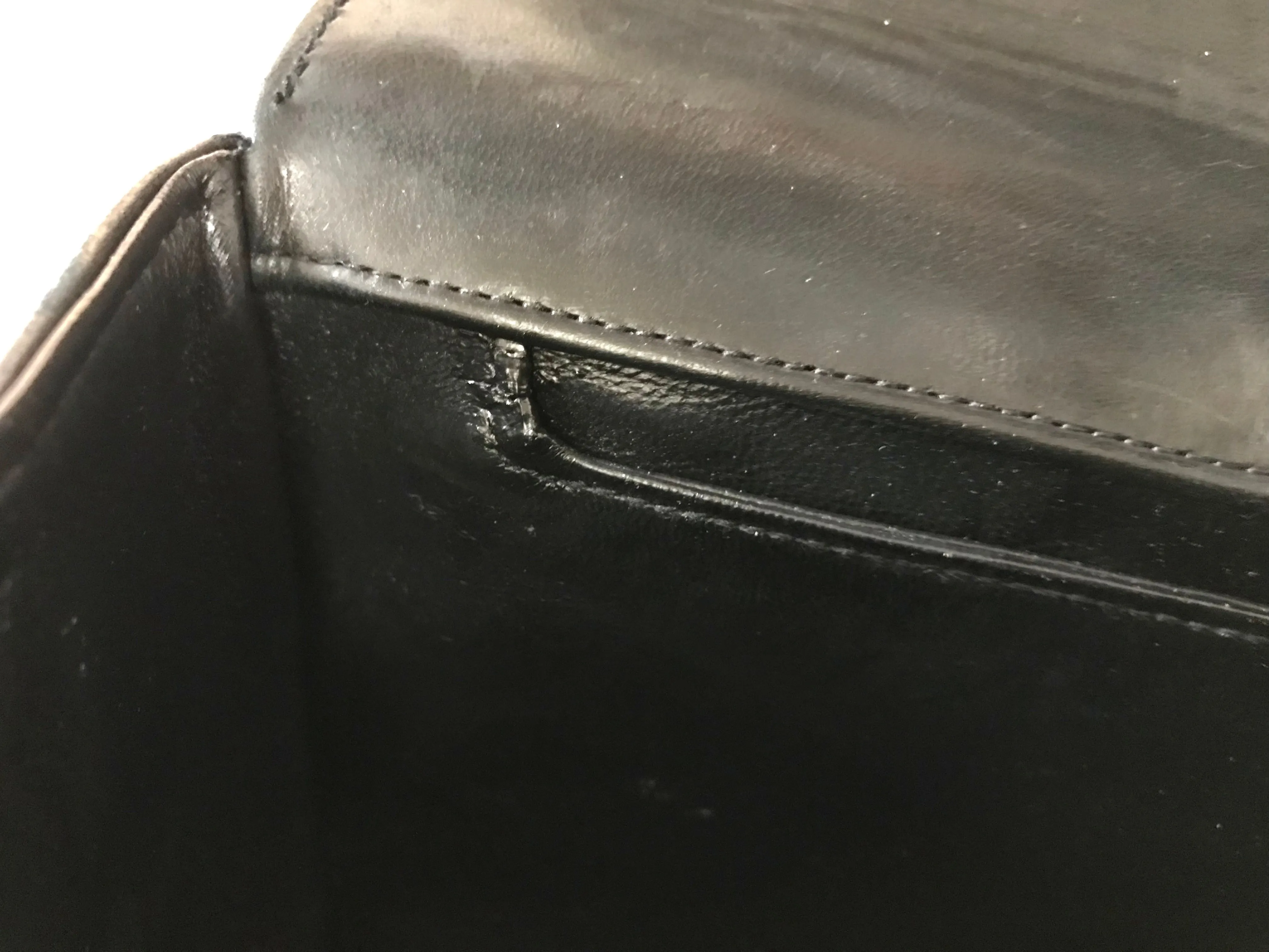 Vintage Chanel black leather 2.55 chain large shoulder bag with white trimming edge and a matching pouch. 0403284