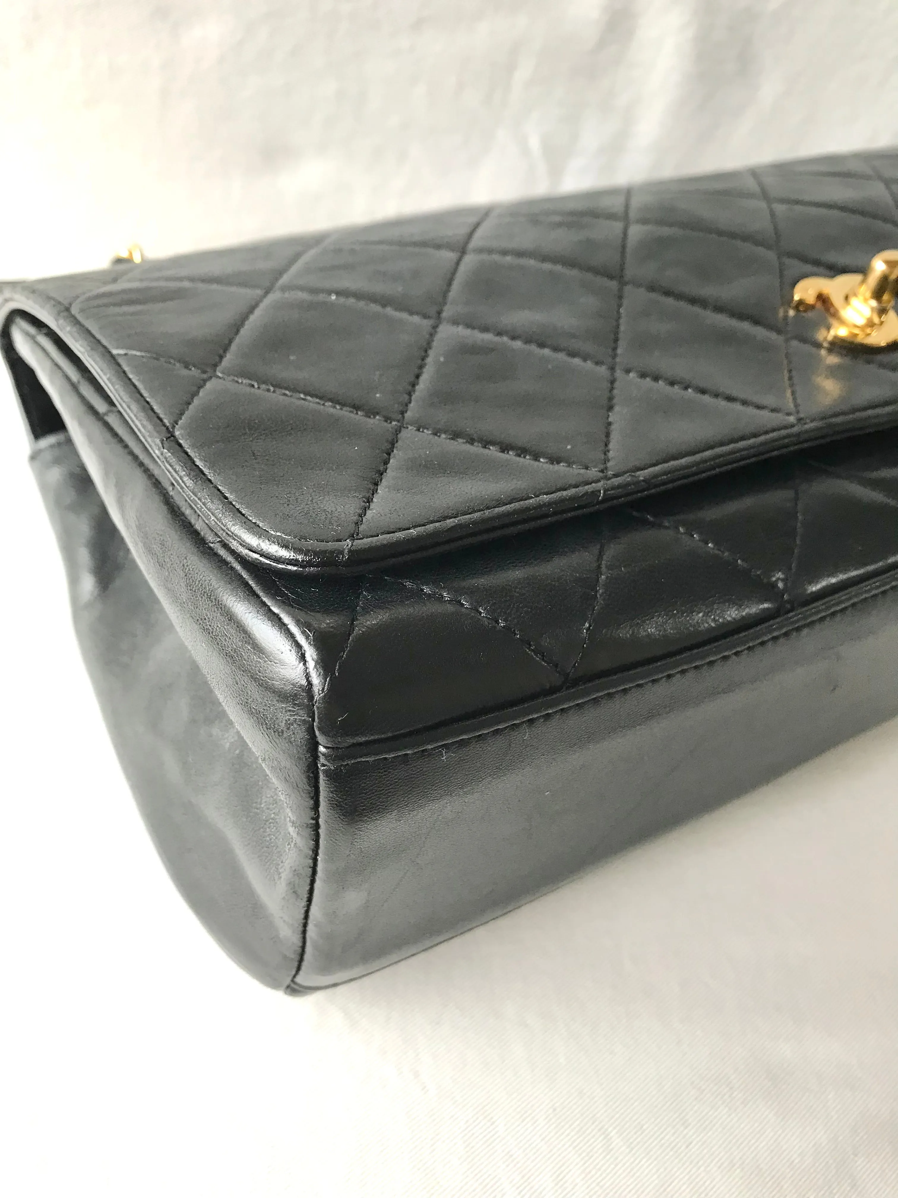 Vintage Chanel black leather 2.55 chain large shoulder bag with white trimming edge and a matching pouch. 0403284
