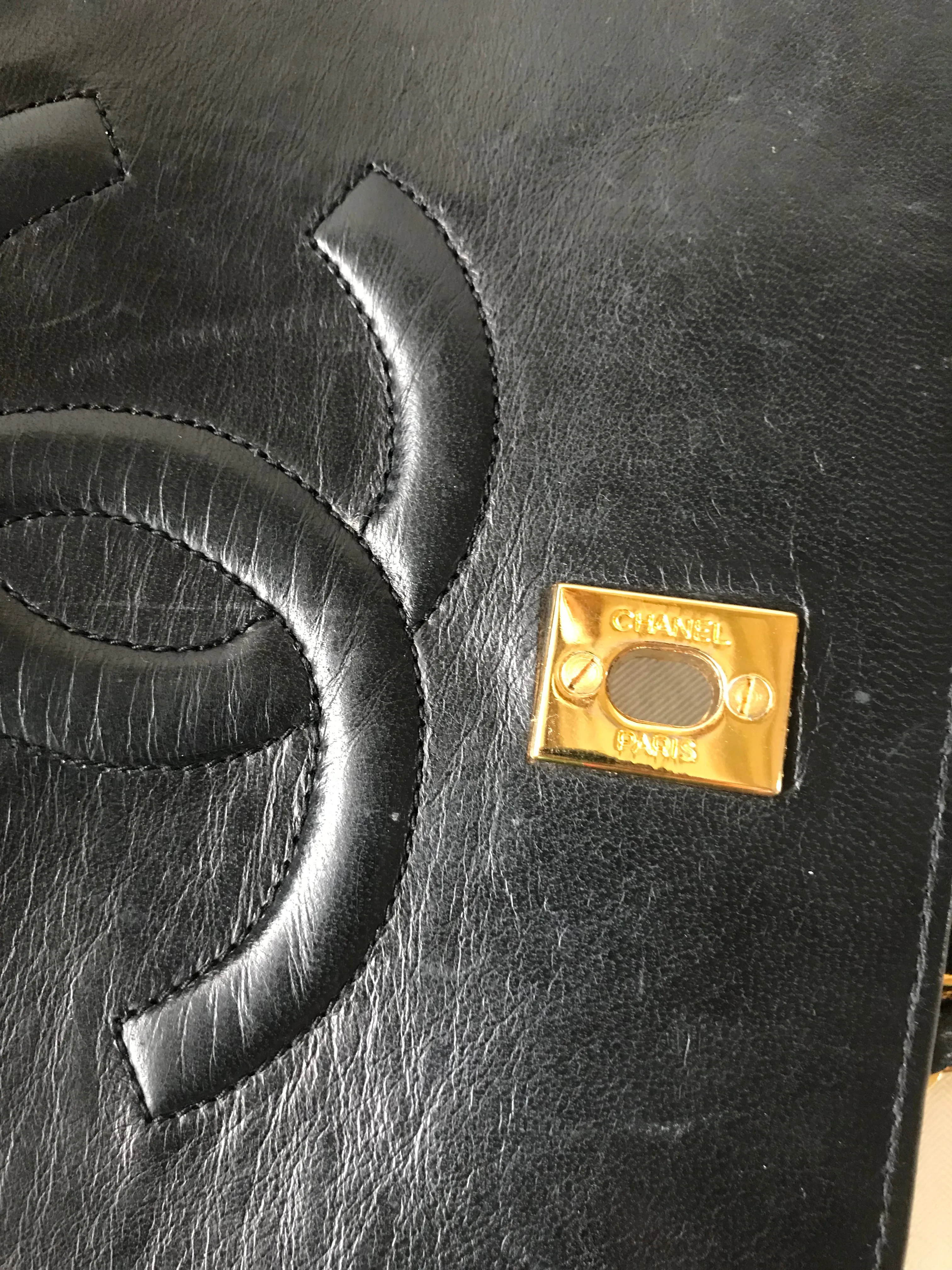 Vintage Chanel black leather 2.55 chain large shoulder bag with white trimming edge and a matching pouch. 0403284