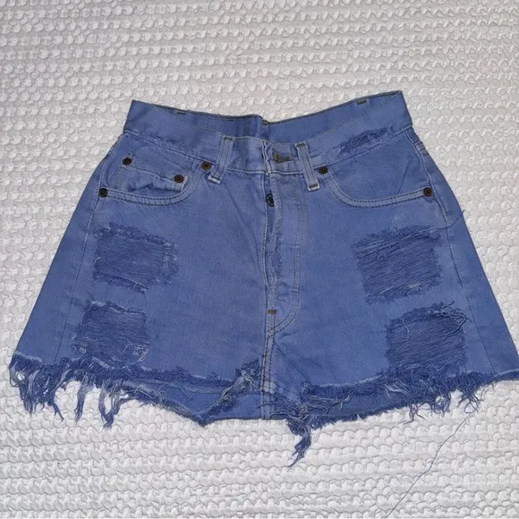 Vintage Levi’s Vintage High Waisted distressed ripped Jean shorts Sz 26