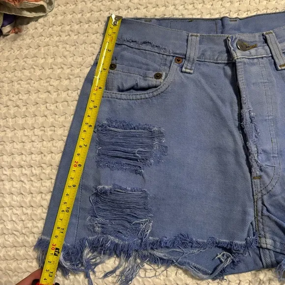 Vintage Levi’s Vintage High Waisted distressed ripped Jean shorts Sz 26
