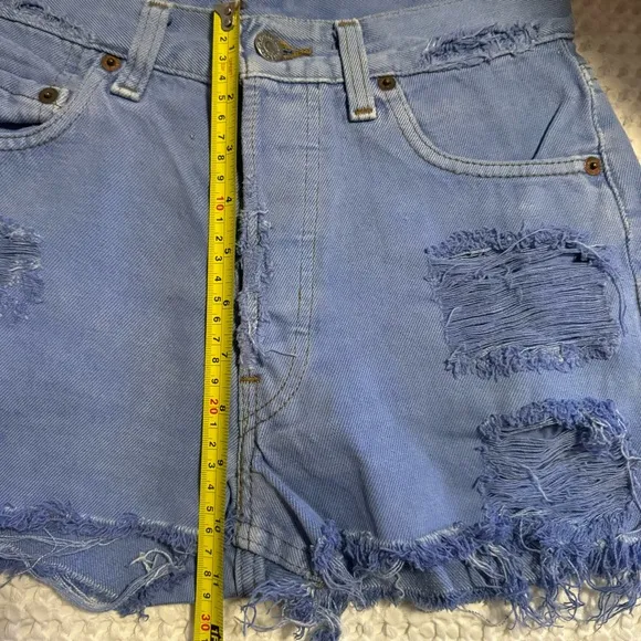 Vintage Levi’s Vintage High Waisted distressed ripped Jean shorts Sz 26