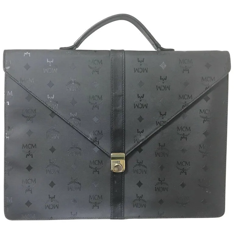 Vintage MCM black monogram briefcase, business bag, document purse with leather handle. Great masterpiece by Michael Cromer. 050320r19
