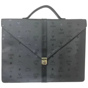 Vintage MCM black monogram briefcase, business bag, document purse with leather handle. Great masterpiece by Michael Cromer. 050320r19
