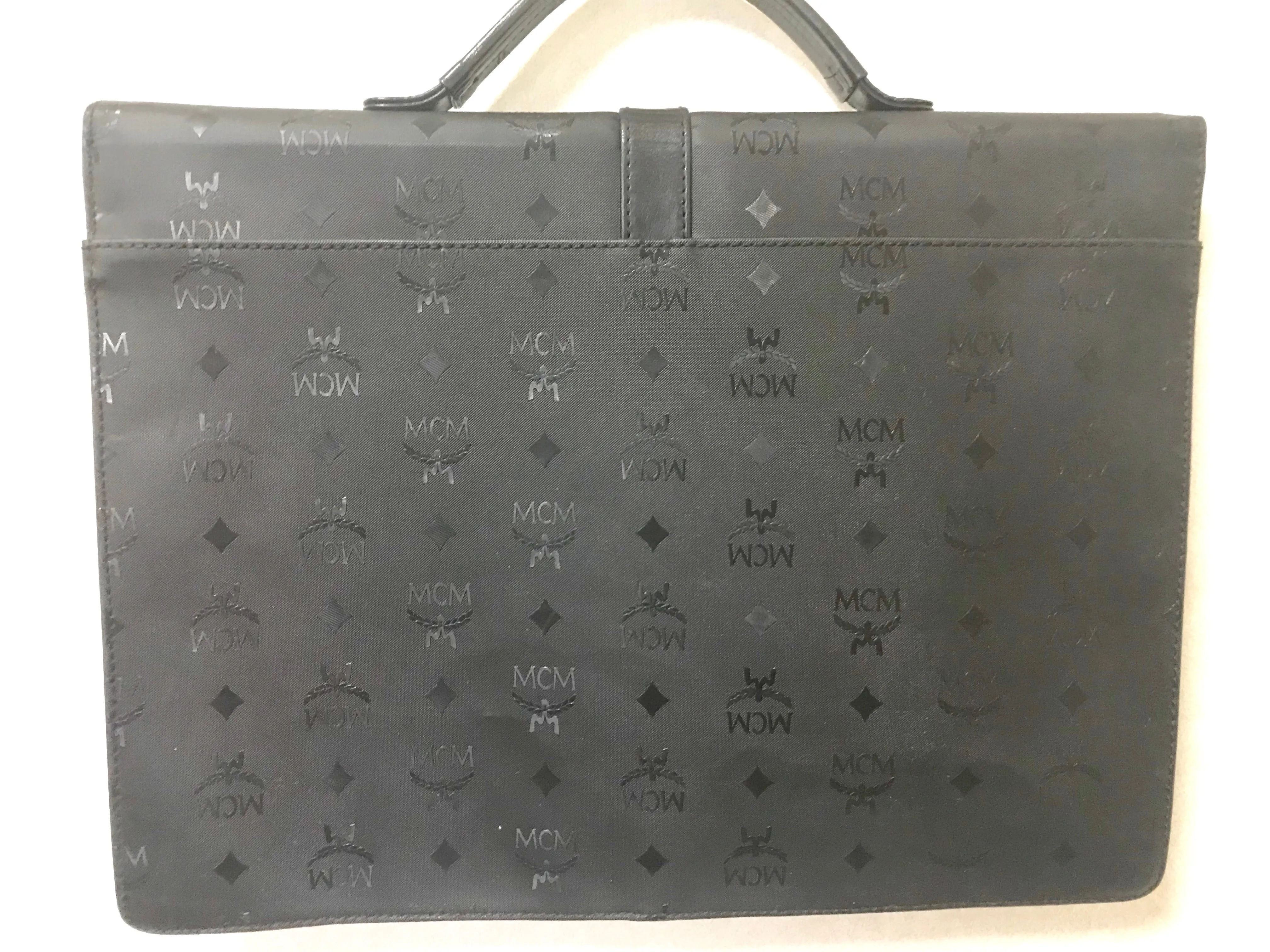 Vintage MCM black monogram briefcase, business bag, document purse with leather handle. Great masterpiece by Michael Cromer. 050320r19