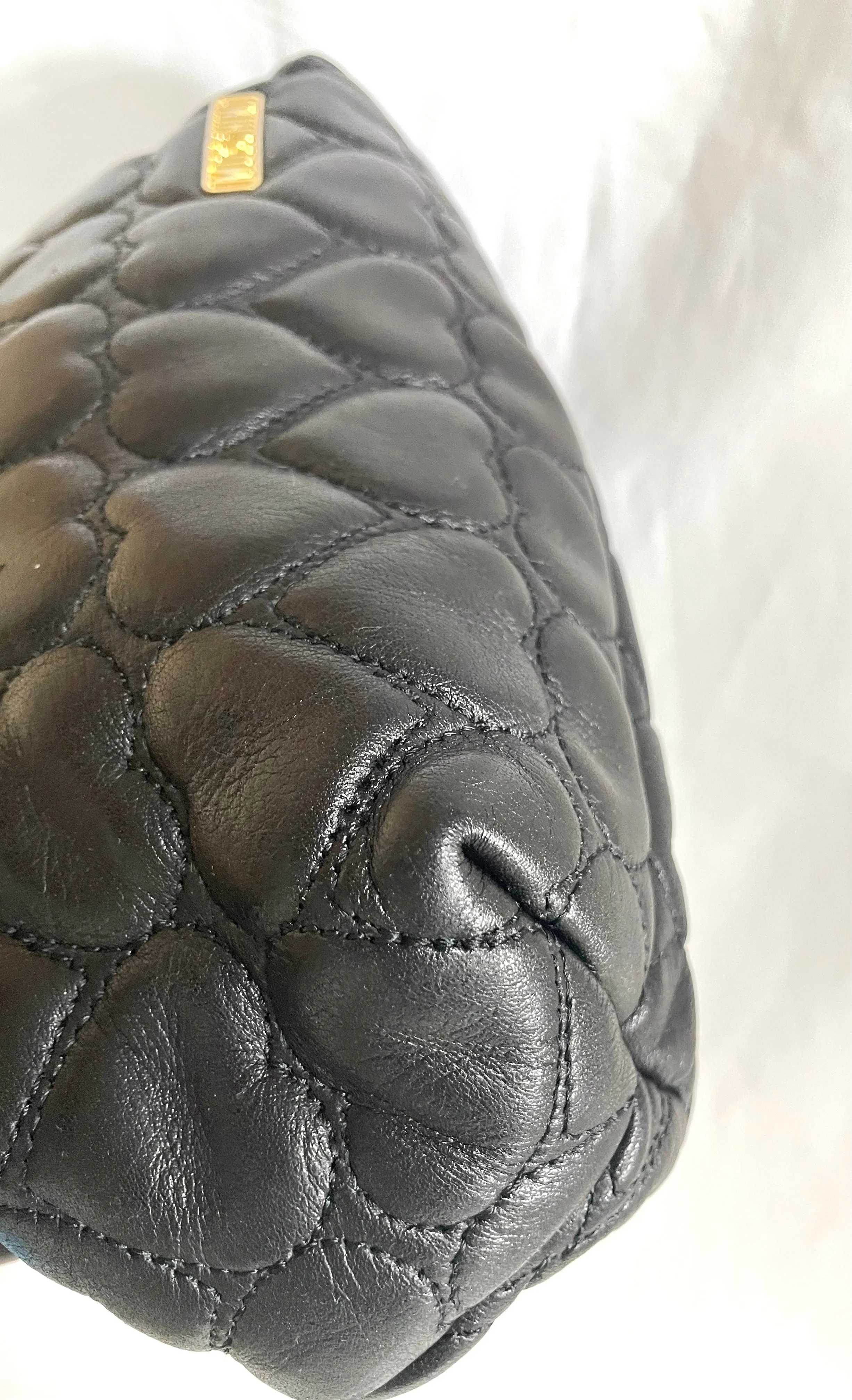 Vintage MOSCHINO black heart shape quilted lambskin mini handbag, tote purse. Too cute to carry.