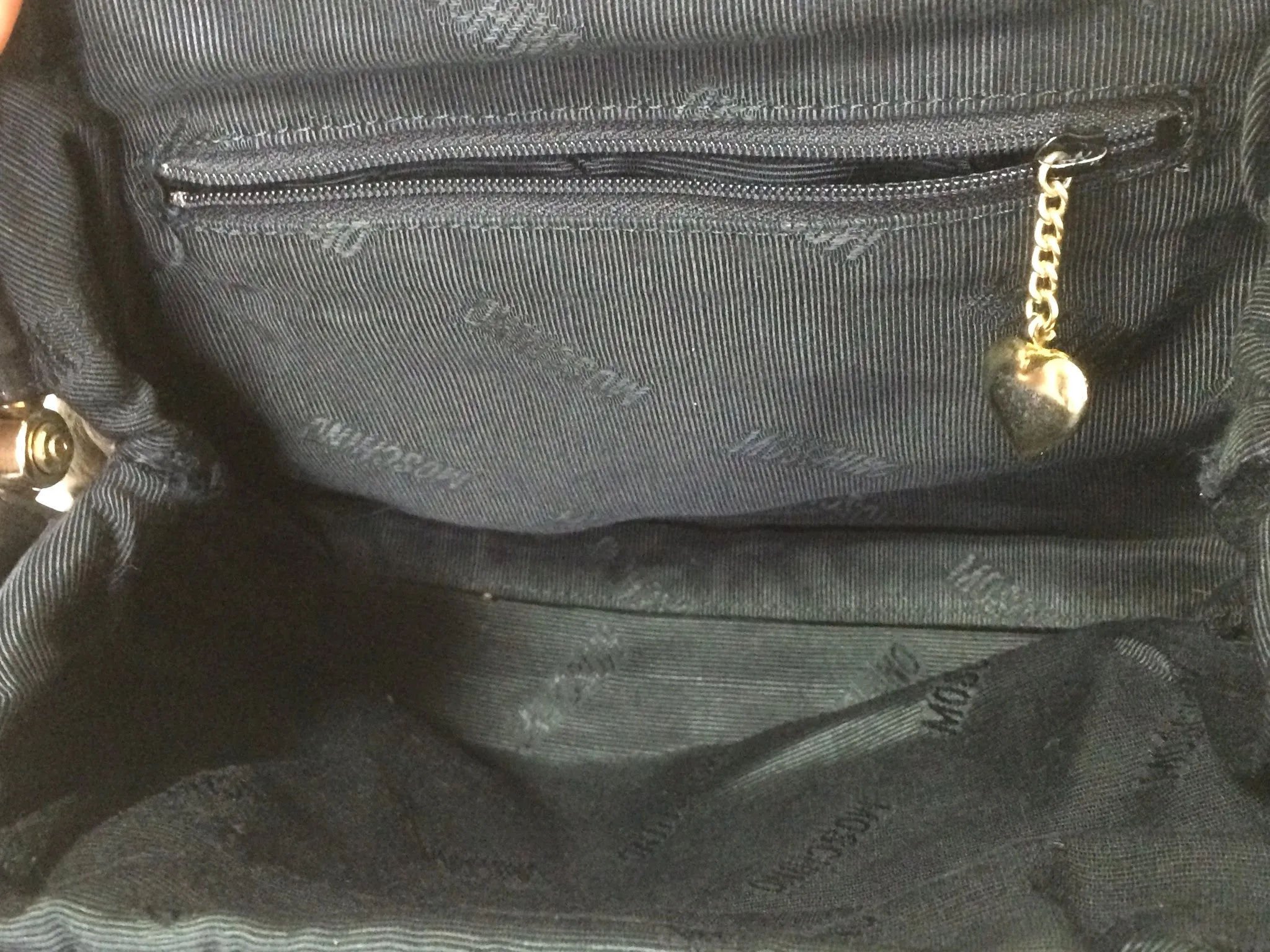 Vintage MOSCHINO black heart shape quilted lambskin mini handbag, tote purse. Too cute to carry.