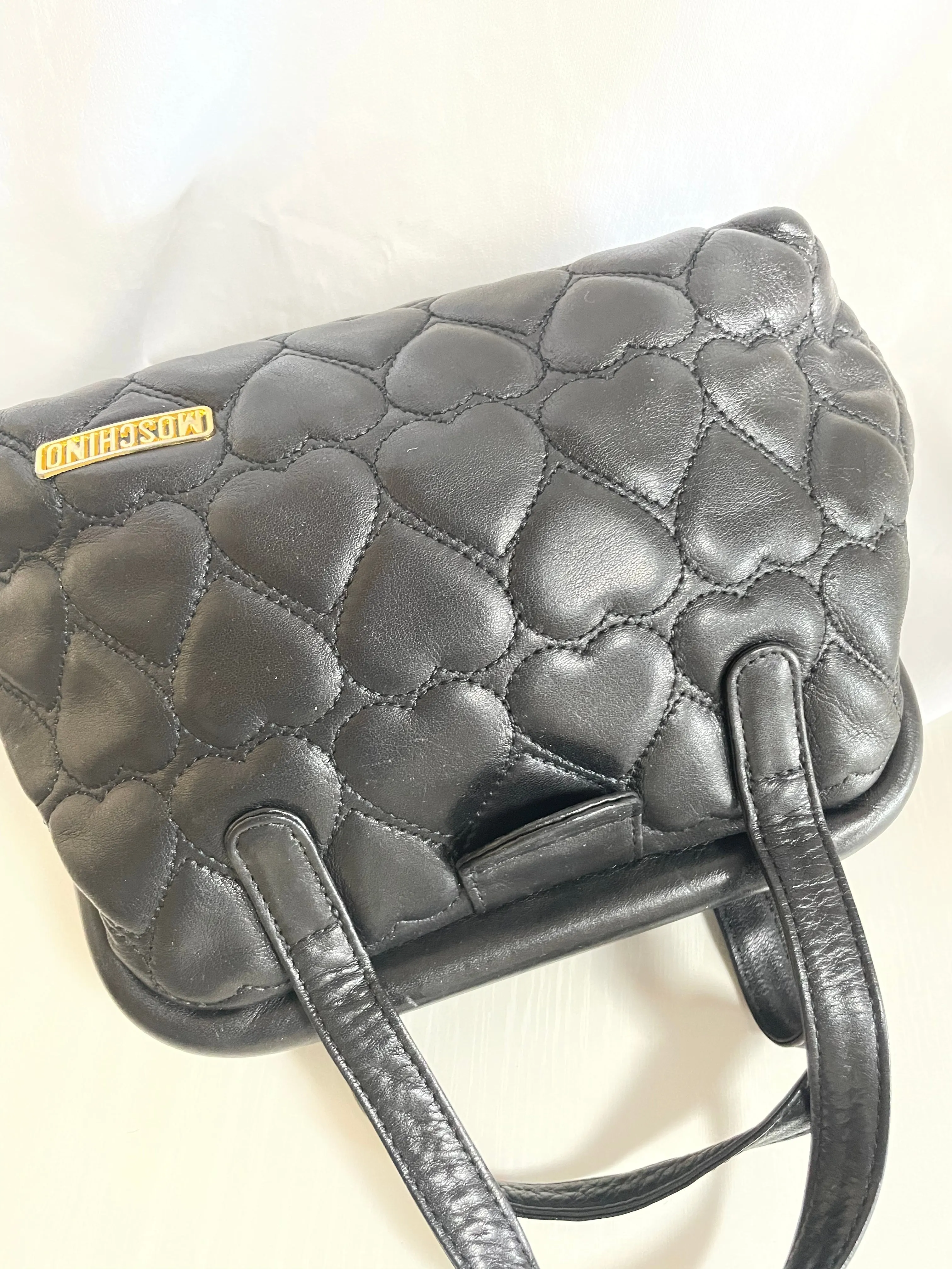 Vintage MOSCHINO black heart shape quilted lambskin mini handbag, tote purse. Too cute to carry.