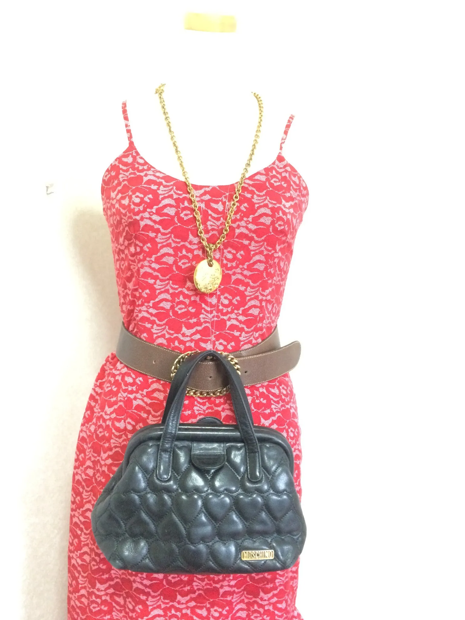 Vintage MOSCHINO black heart shape quilted lambskin mini handbag, tote purse. Too cute to carry.