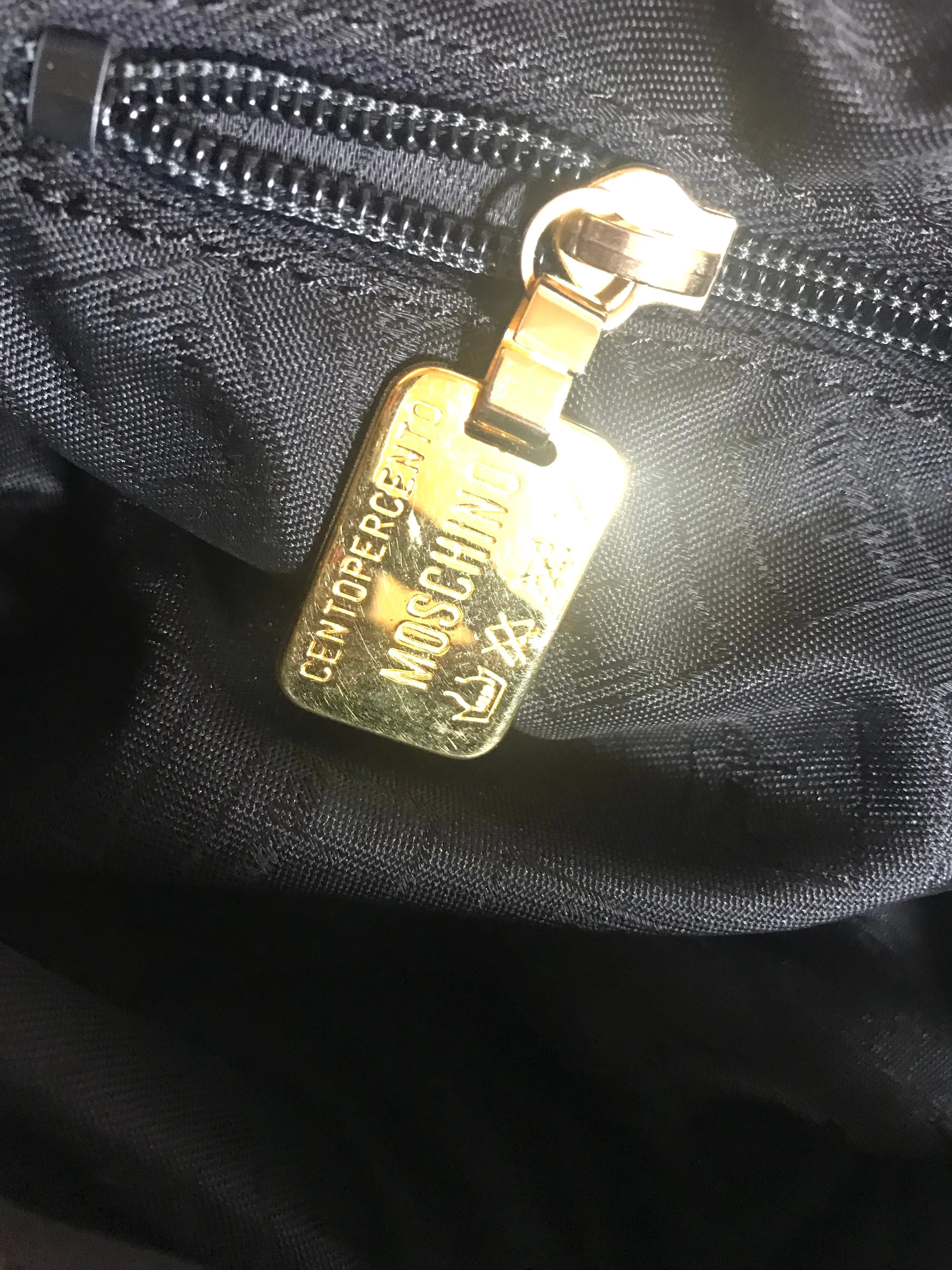 Vintage Moschino soft brown leather drum shape shoulder bag with iconic Question marks. Moschino by Redwall. Made in Italy. 060724r1 Moschino by Redwall. Made in Italy.
